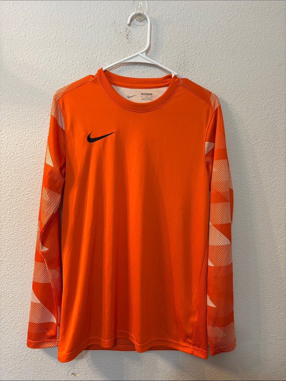 Nike Men’s Orange Long-Sleeve Athletic Top with Patterned Sleeves